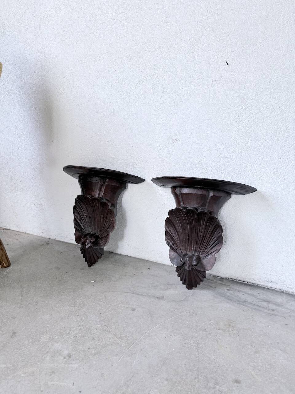Pair of carved Italian wall consoles