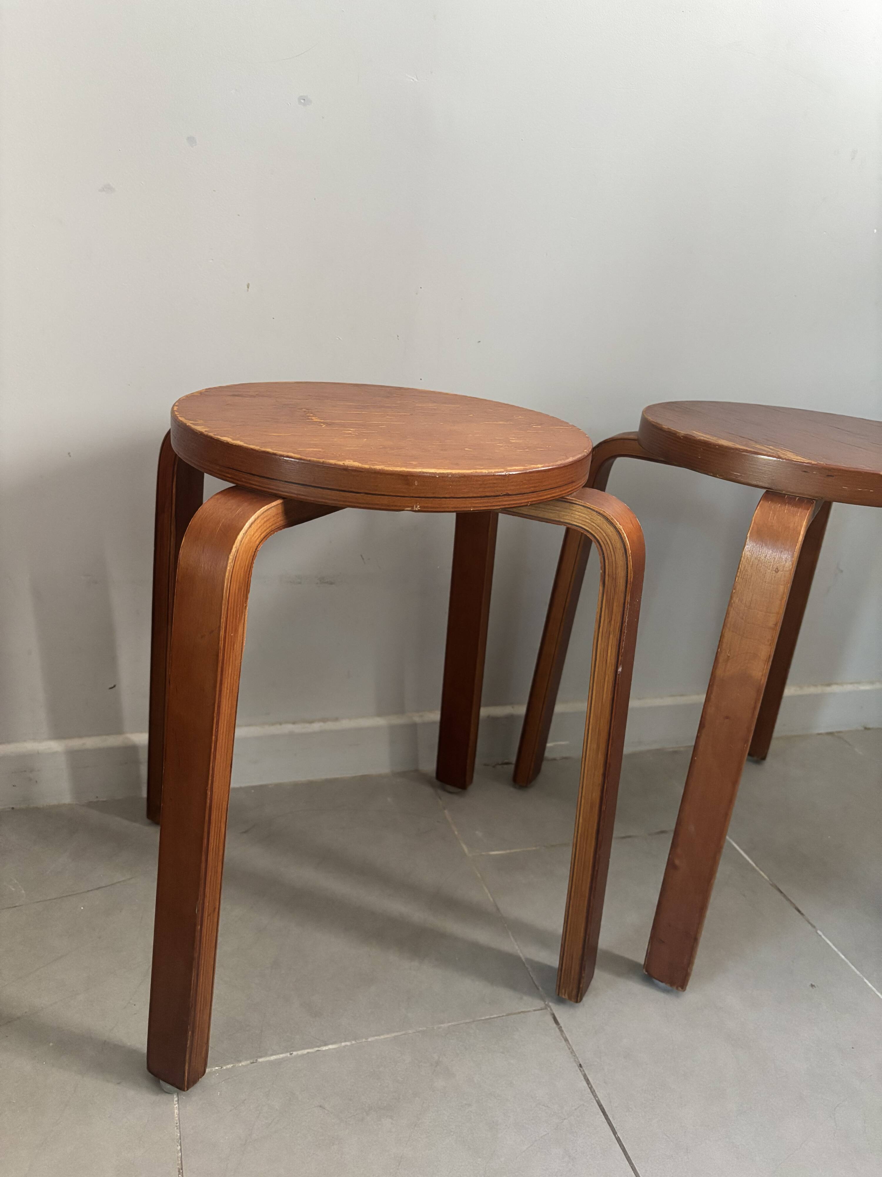 Pair of Artek stools model E60 (rare version with 4 legs), Alvar Aalto