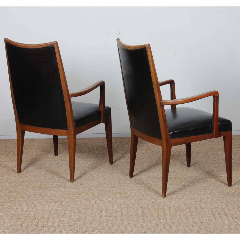 Pair of vintage wooden and leather armchairs from the 1950s.