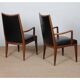 Pair of vintage wooden and leather armchairs from the 1950s.