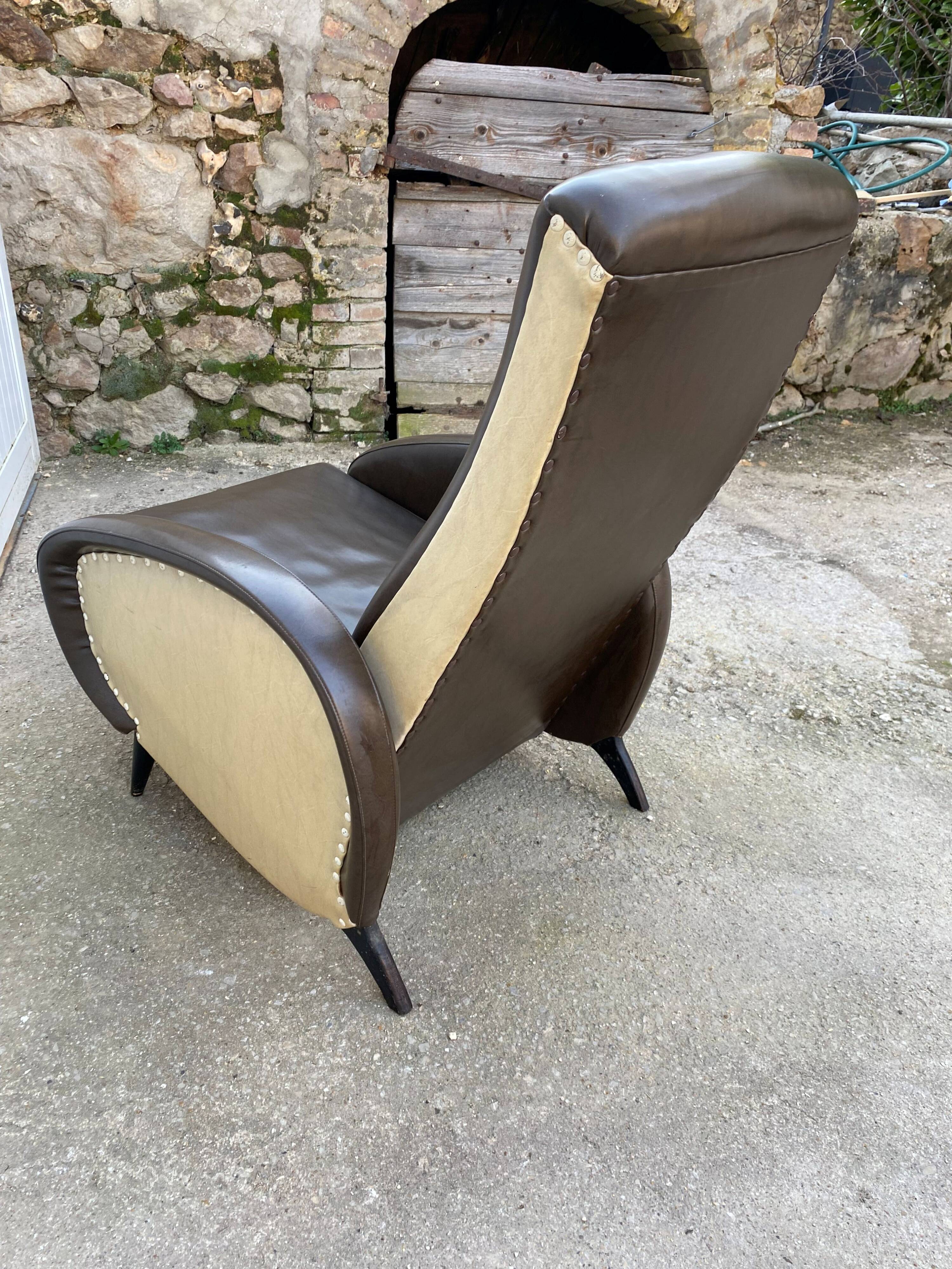 Vintage 50 faux leather reclining lounge chair with footrest