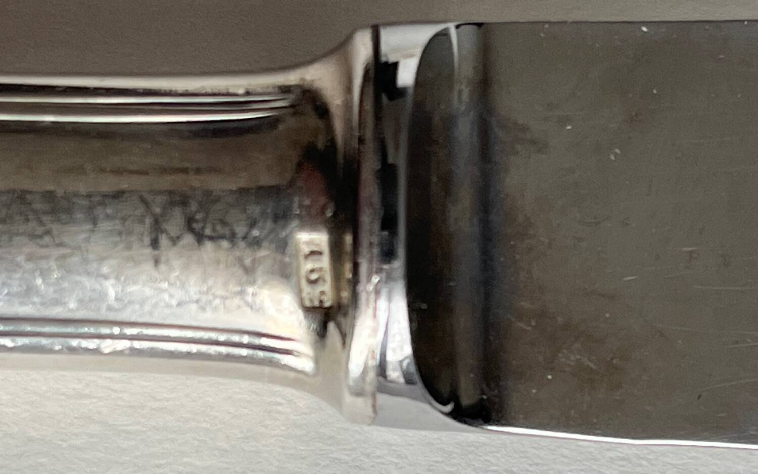 12 silver metal knives