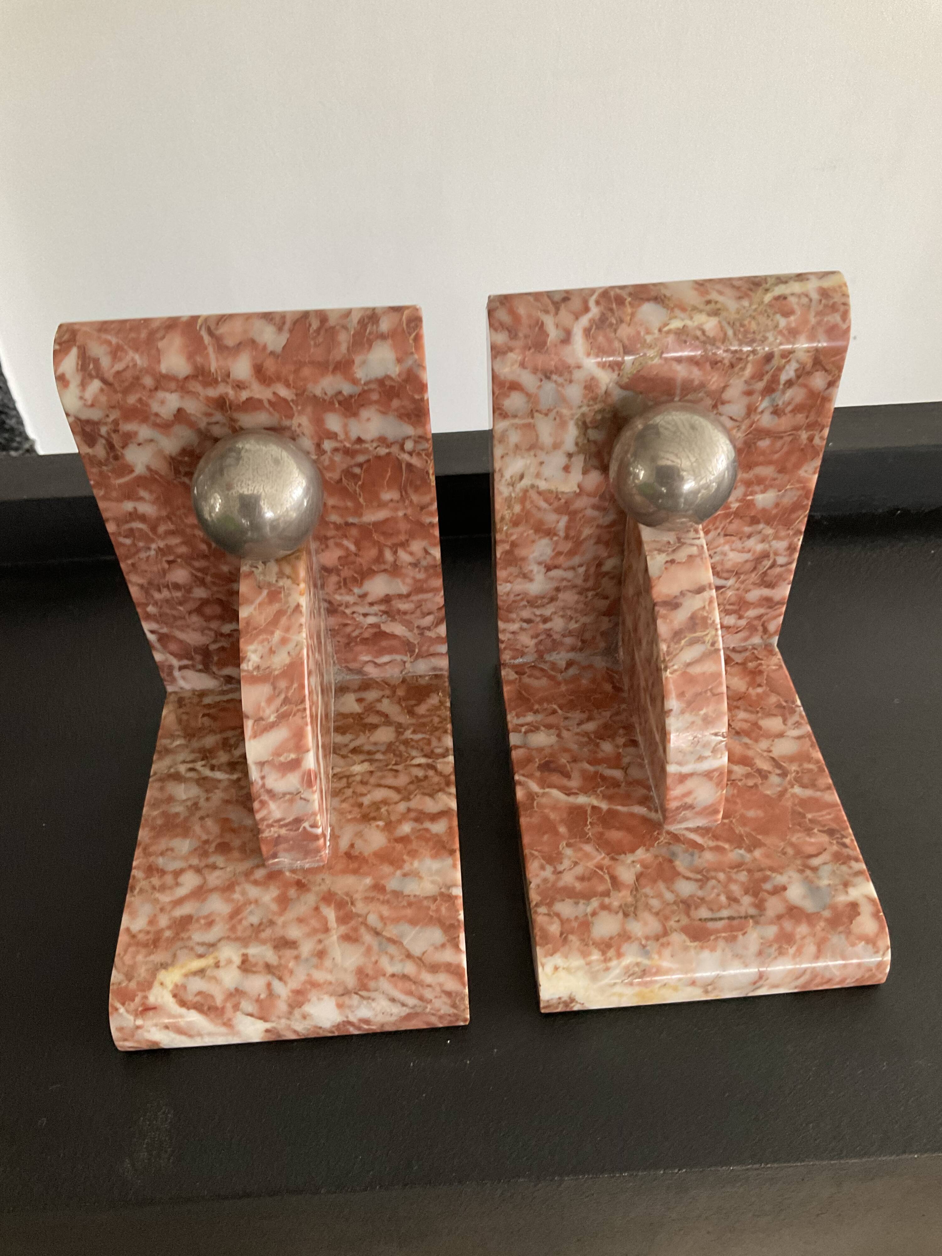 Pair of art deco series-books in marble and brass