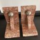 Pair of art deco series-books in marble and brass