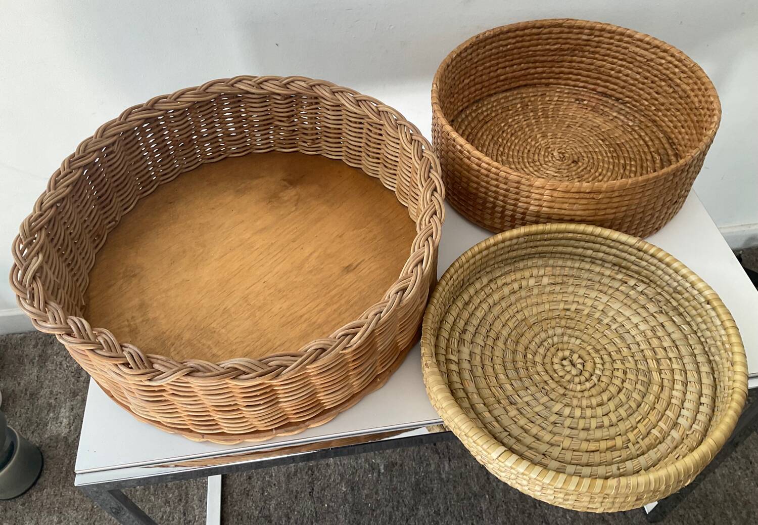Trio of vintage wicker and woven raffia baskets