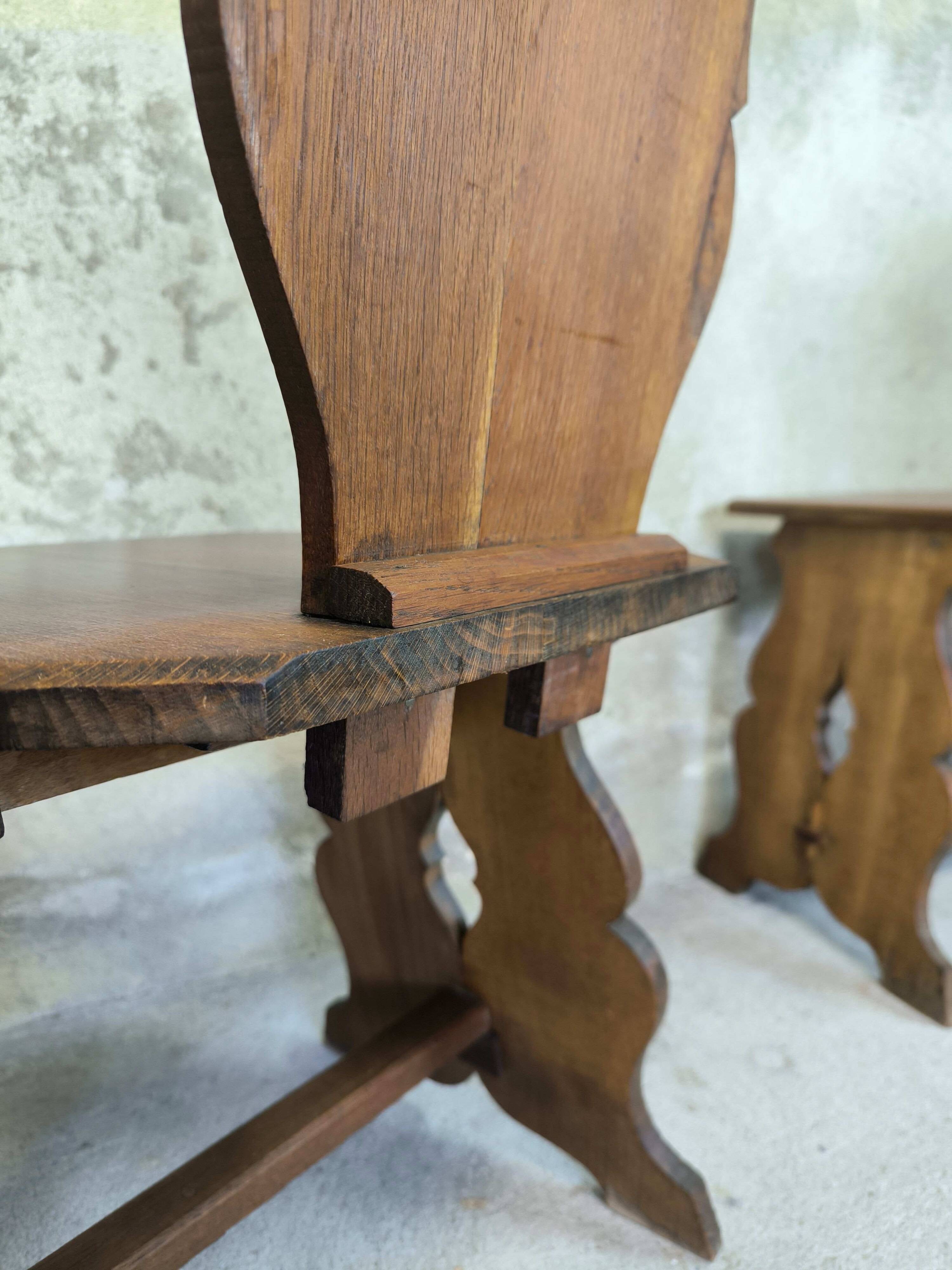 Set of six vintage brutalist wooden chairs.