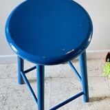Vintage wooden stool with electric blue paint
