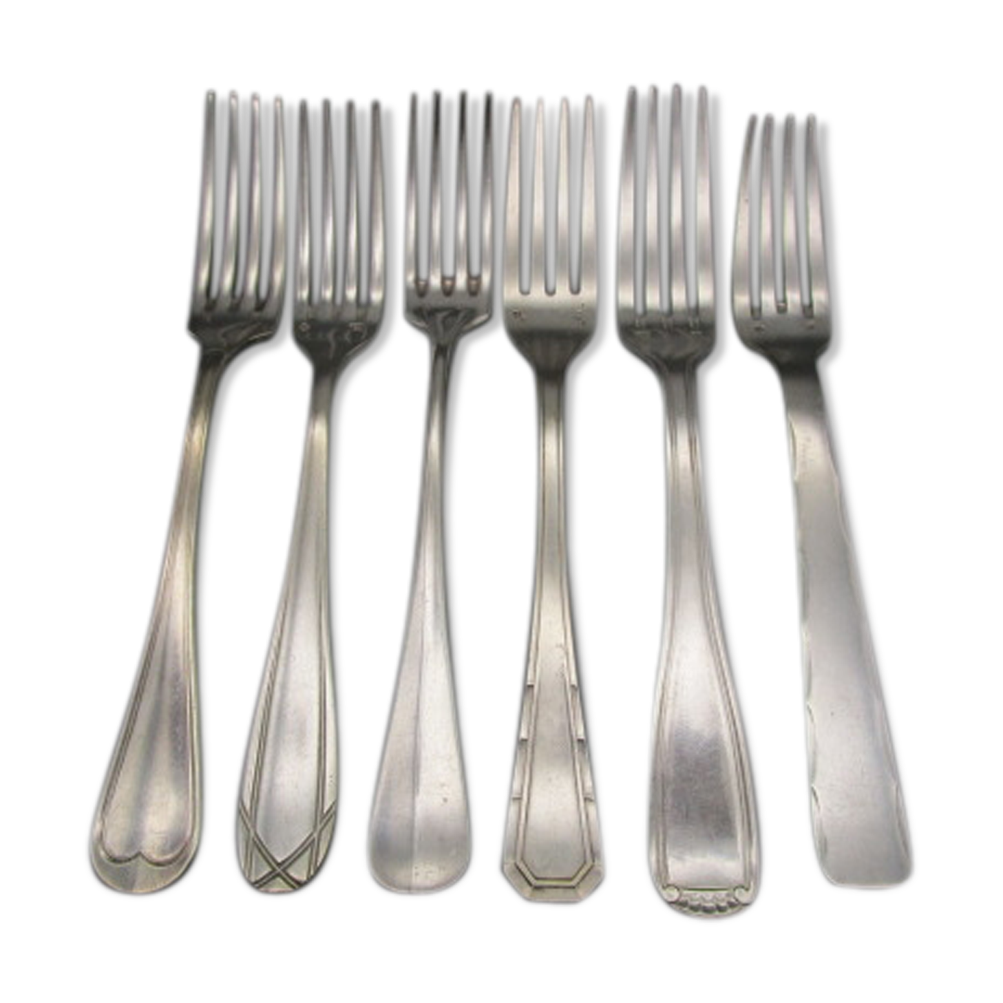 6 antique silver metal forks mismatched for a chic table
