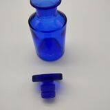 Old perfume bottle in cobalt blue glass