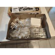 2 boxes of vintage toys