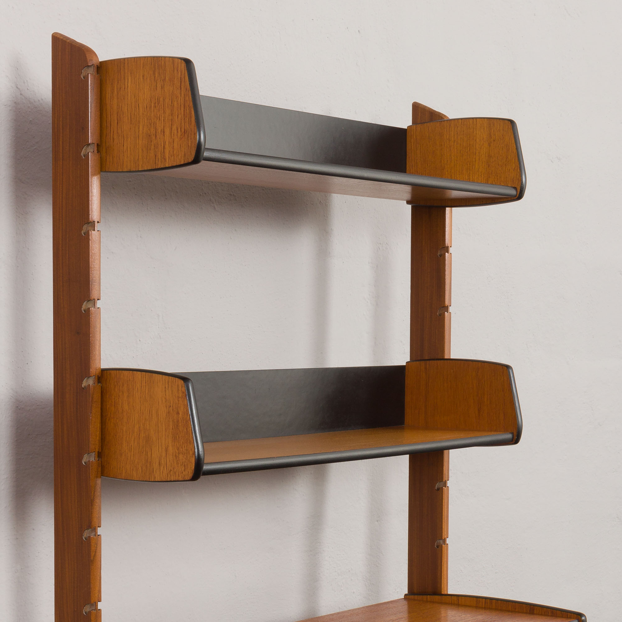 Scandinavian free standing vertical bookcase with a secrtetaire or home office wall unit model Ergo,