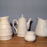 Trio of pitchers and jam jar