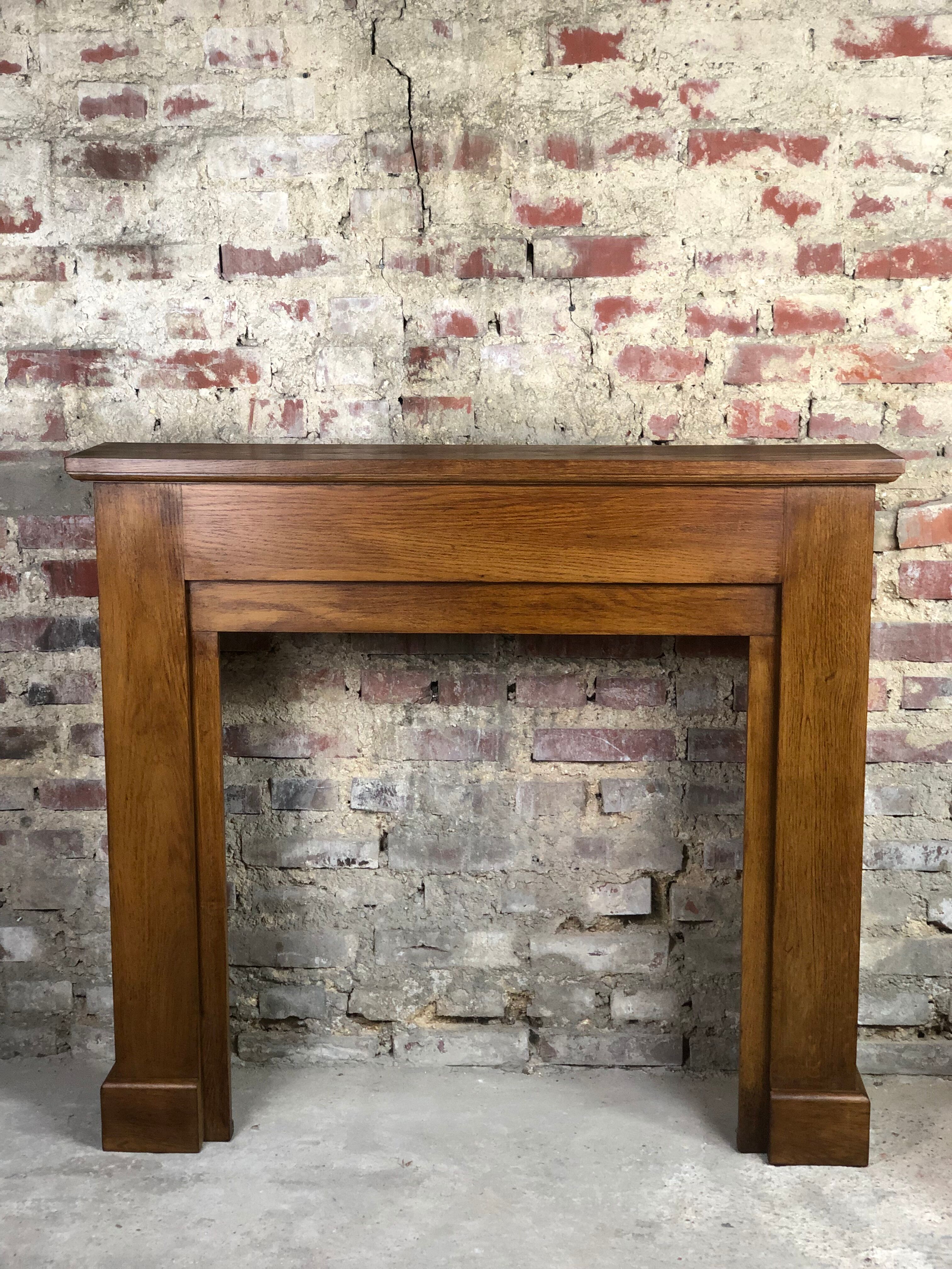 Fireplace surround in light oak 1980s