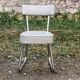 Set of 2 chairs and 1 armchair from the 70s in chrome metal and faux leather.