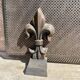 Fireplace screen in metal with cast iron fleur-de-lis.