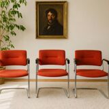 3 vintage chrome metal armchairs with orange fabric tops