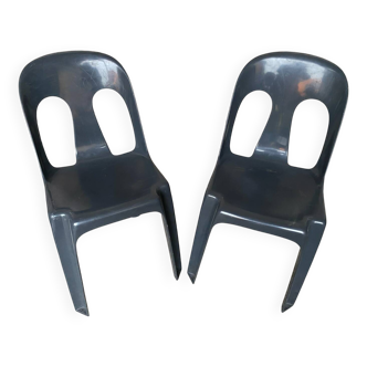 Pair of antique chairs stamp design henri massonnet black plastic 80's