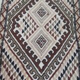 White carpet with multicolored Berber patterns handmade