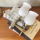 Pair of torch wall lights in brass, white glass and porcelain.