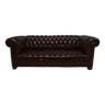 Upholstered brown leather Chesterfield sofa