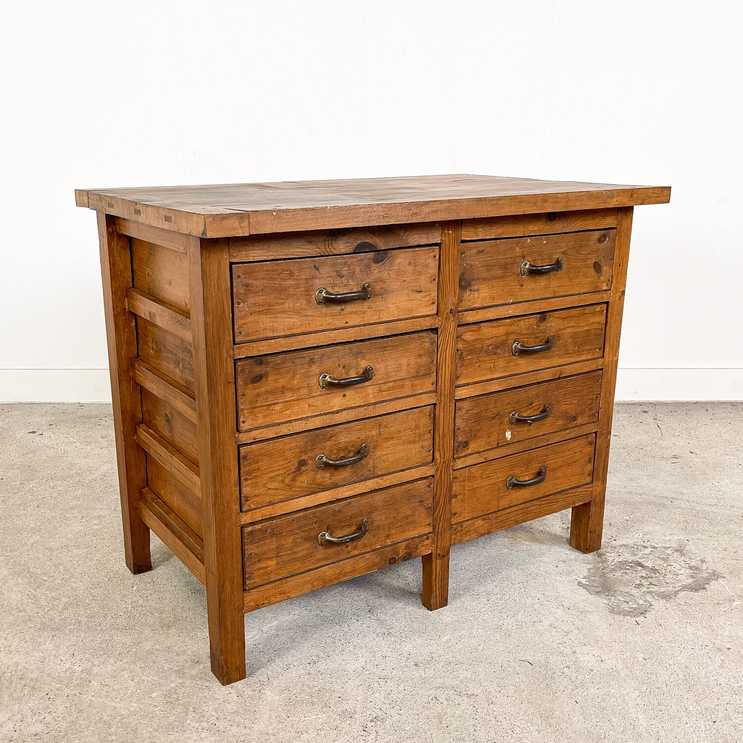 Vintage industrial wooden workbench with drawers