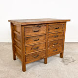 Vintage industrial wooden workbench with drawers