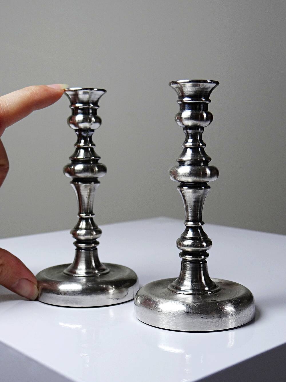 Pair of small antique silver-plated candlesticks, Georgian style.