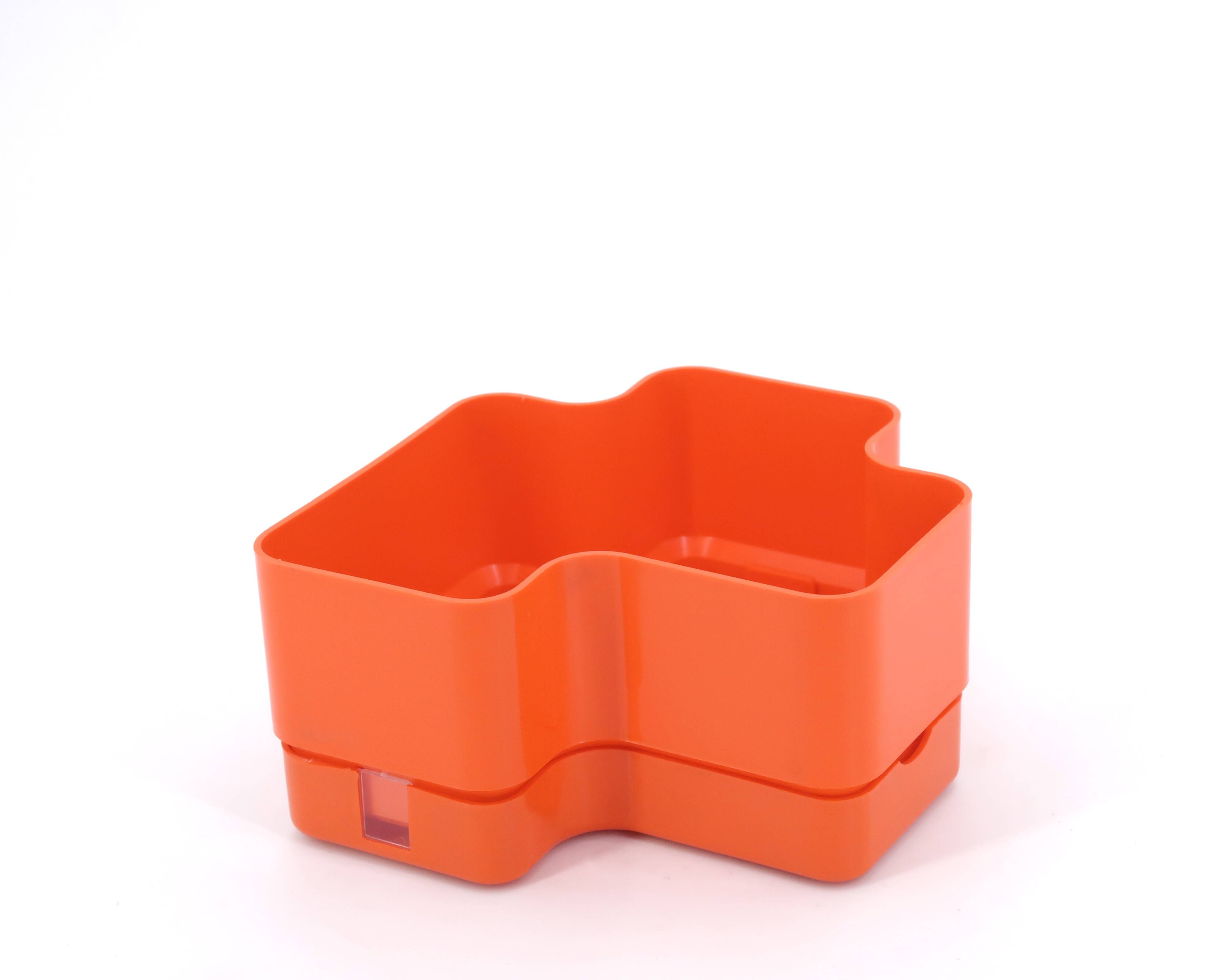 Vastill planter in orange plastic by Michael McCann