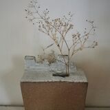 Vase architecture in raw sandstone.
