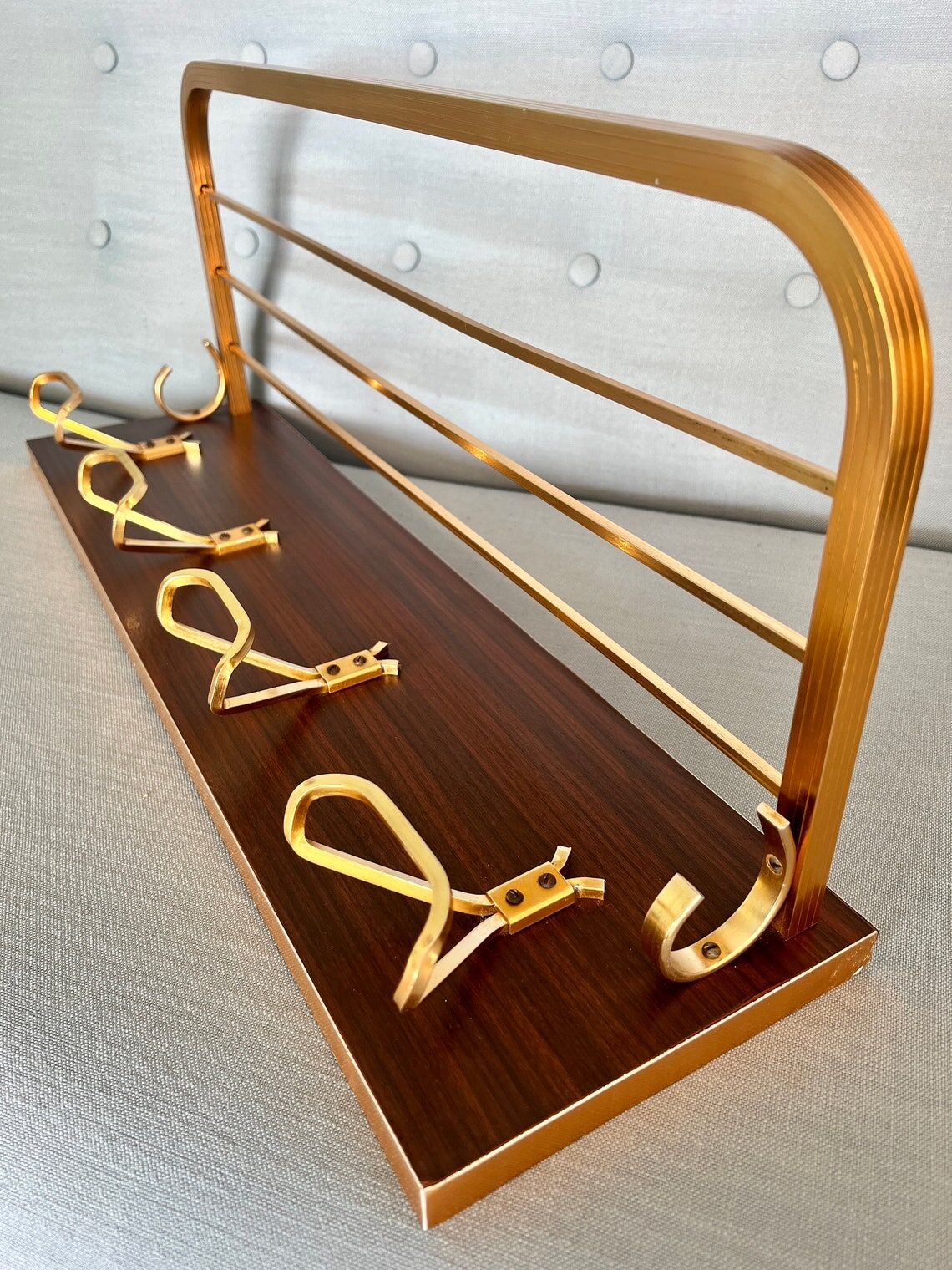 Vintage coat rack with 1970s repai décor