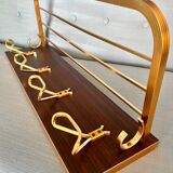 Vintage coat rack with 1970s repai décor