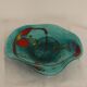 Glove in blue glass
