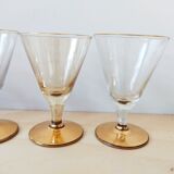 Series of 5 small glasses with golden foot