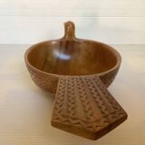 Carved wooden bird pocket