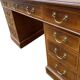 Antique English walnut chest of drawers from the 1930s.