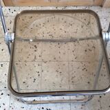 Folded chair by Giancardo Piretti for Castelli