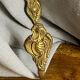 Old bronze coat hook