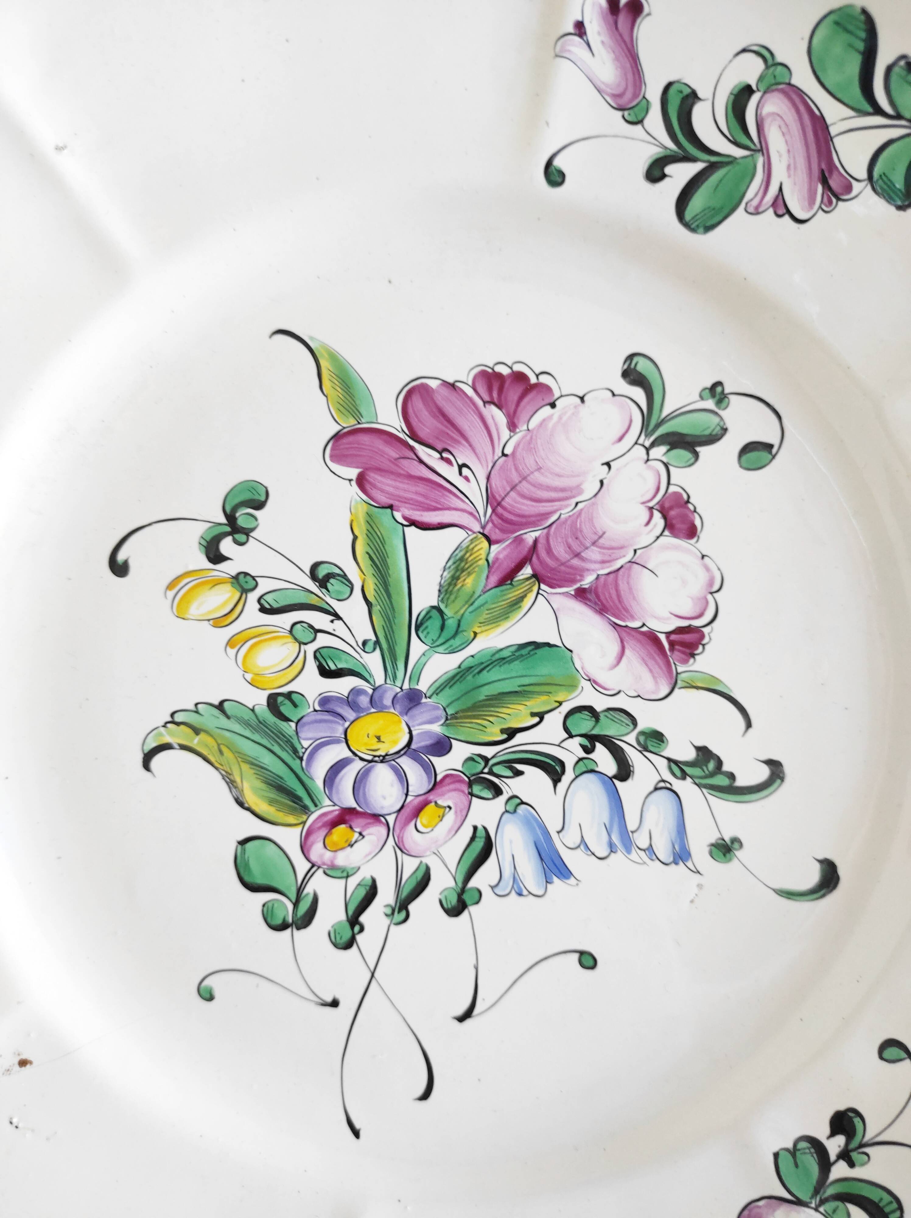 Eastern earthenware plate with flowers