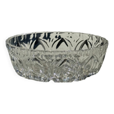 Circular glass ashtray with stylized petal patterns