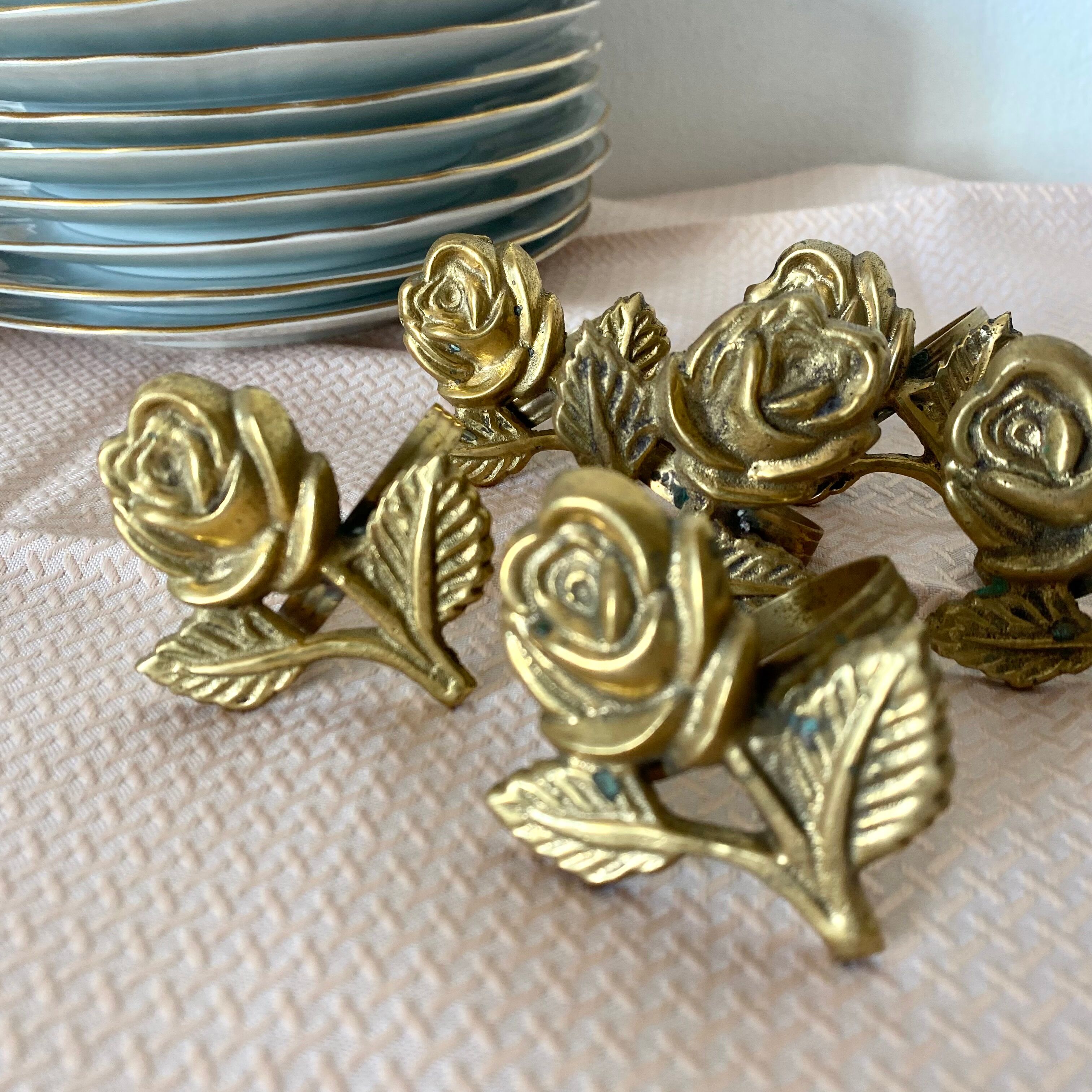Golden brass napkin rings