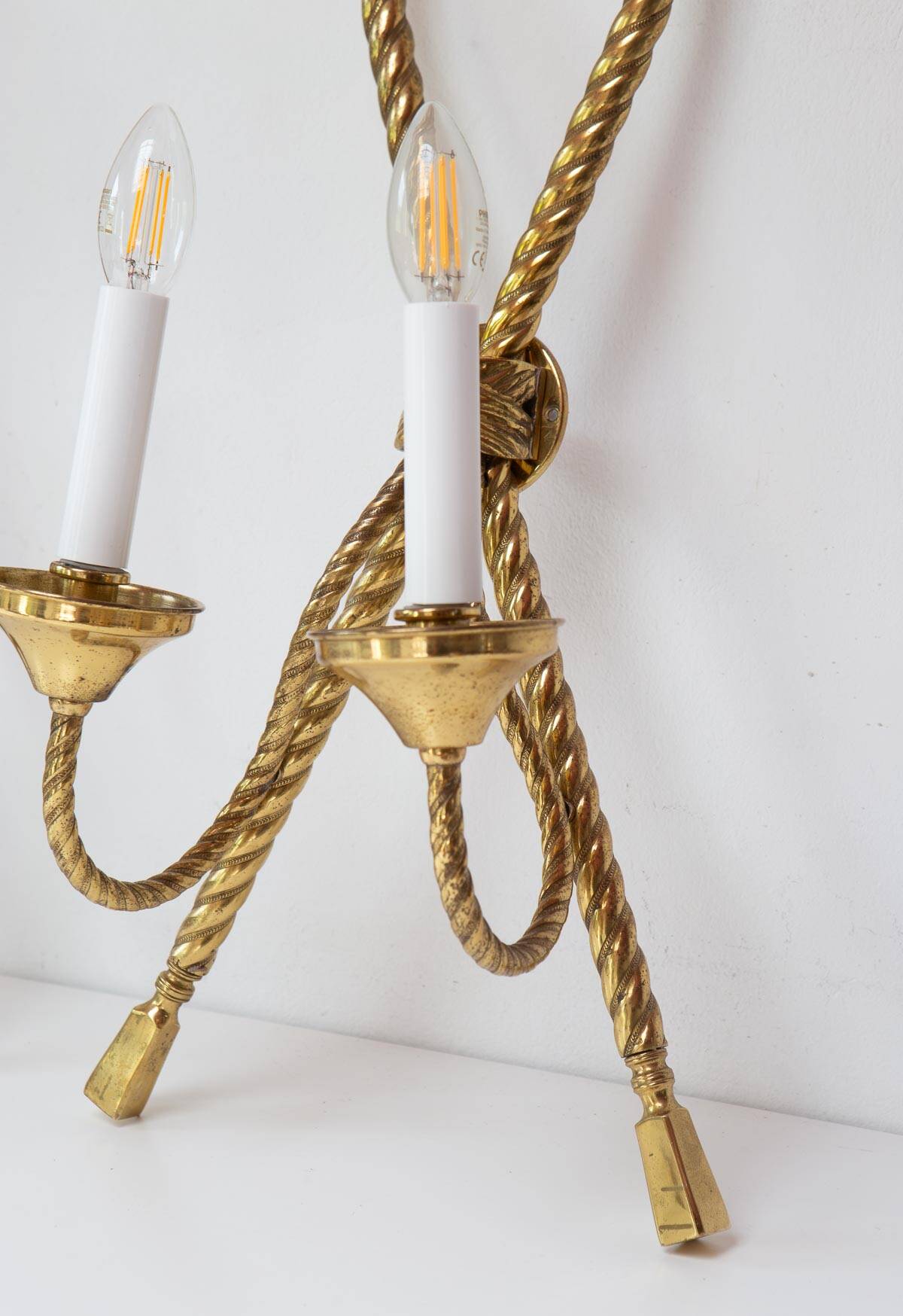 Pair of large gilded brass Noeud wall lights
