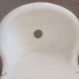 Old wall fountain washbasin