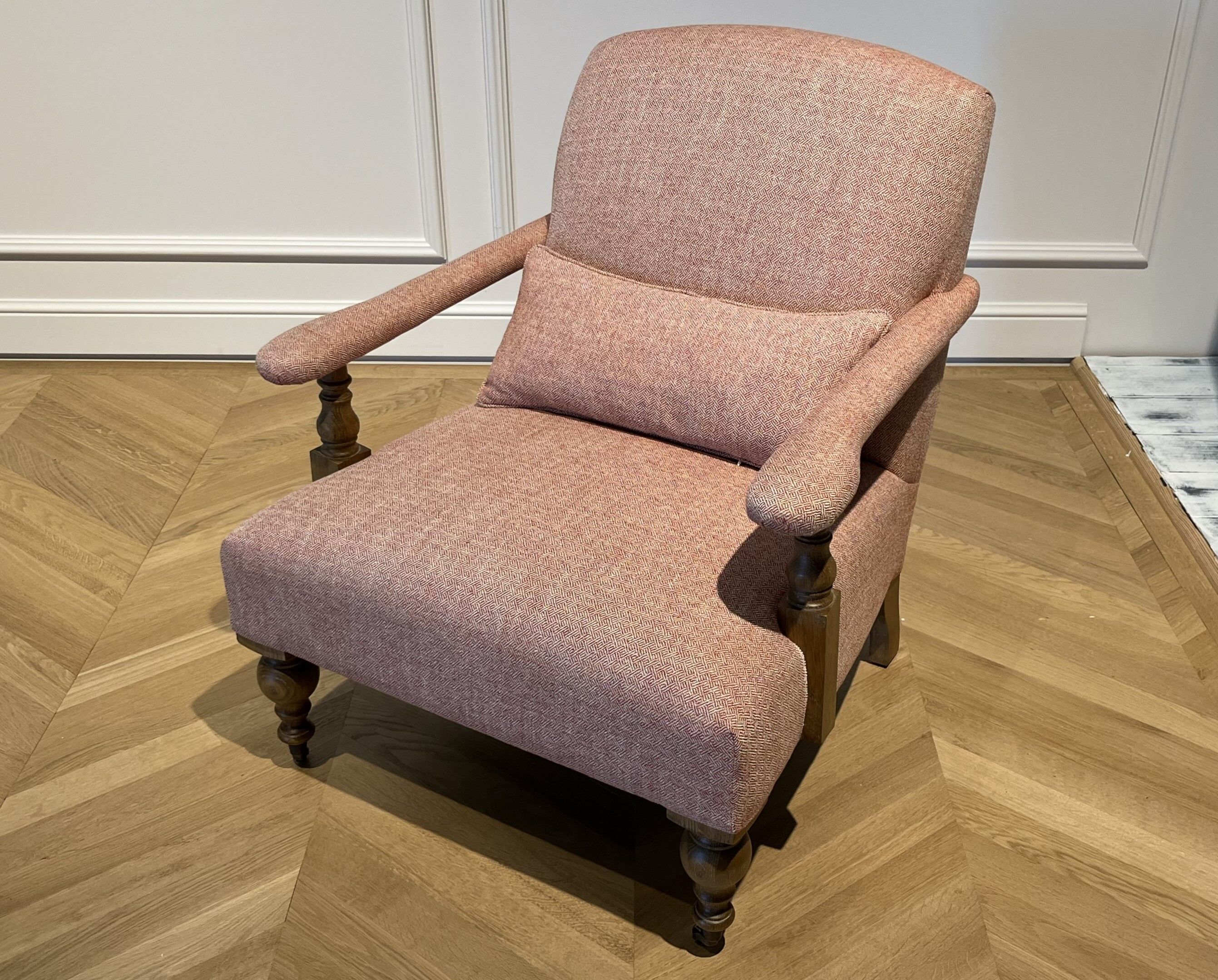 Wooden and red chevron fabric armchair with casters