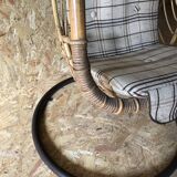 Vintage rattan hanging chair with its stand.