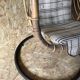 Fauteuil suspendu vintage en rotin avec sa potence