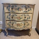 Serpentine commode, 18th century style, Italian, painted and gilded with patterns.
