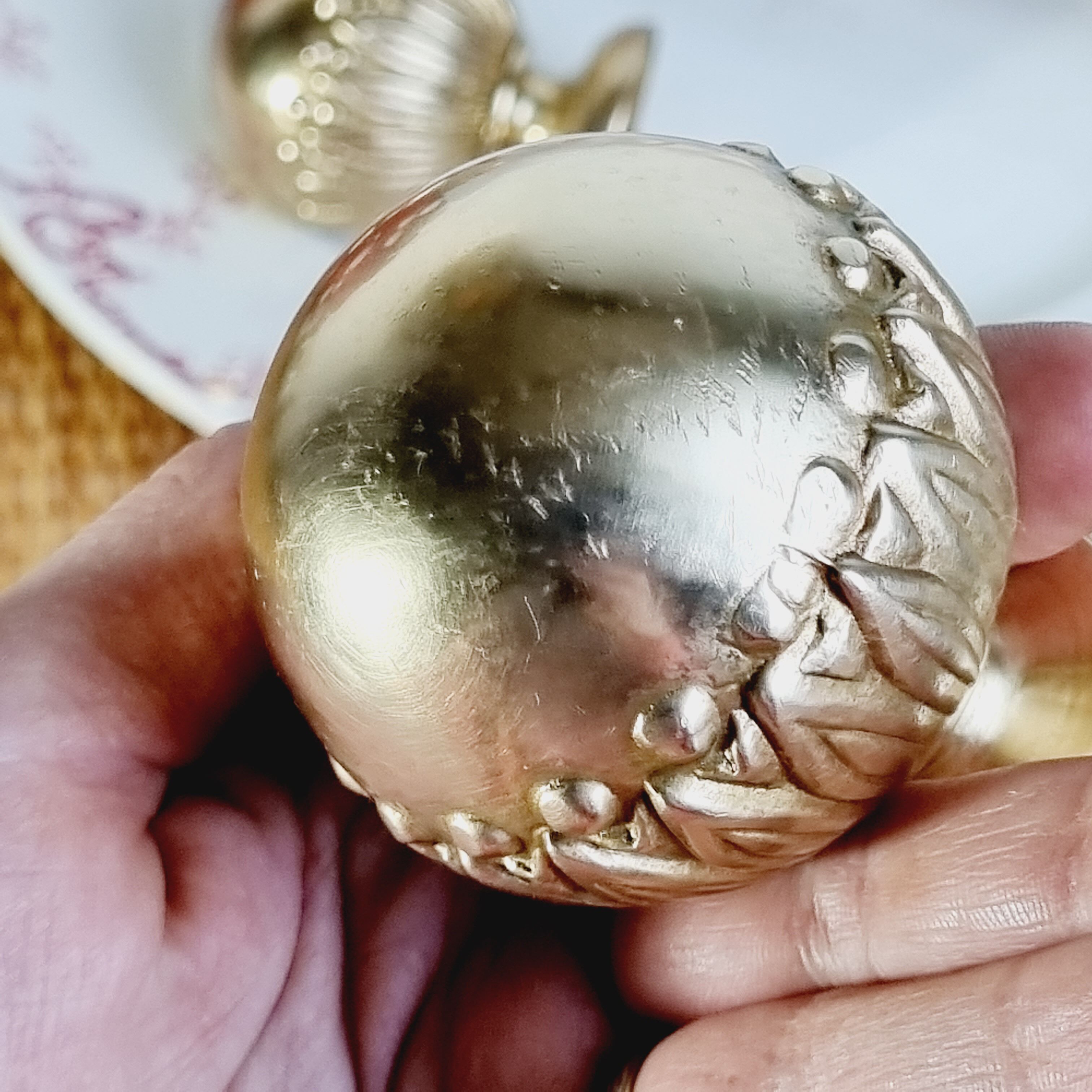 2 gilded brass door handles