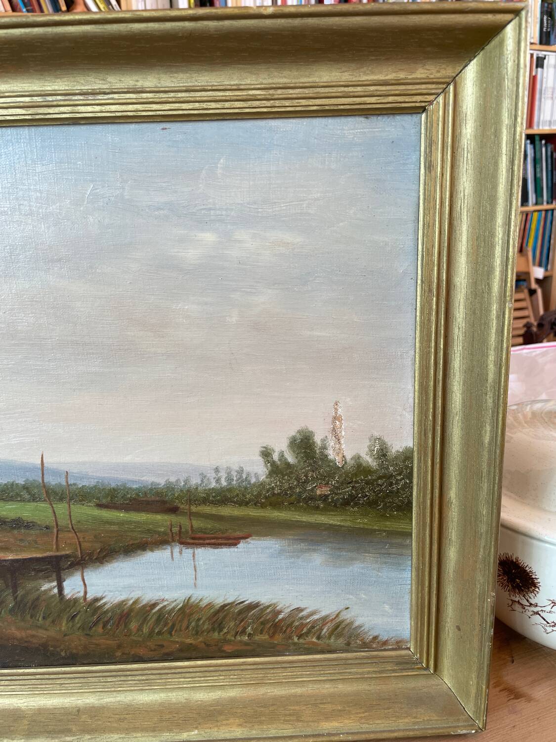 Oil painting of a riverside signed EM