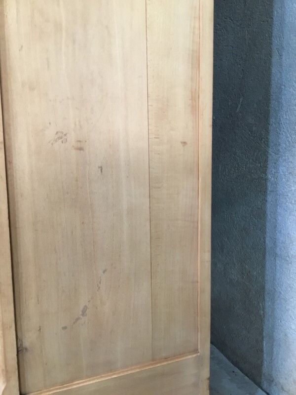 Raw wood hotel cabinet