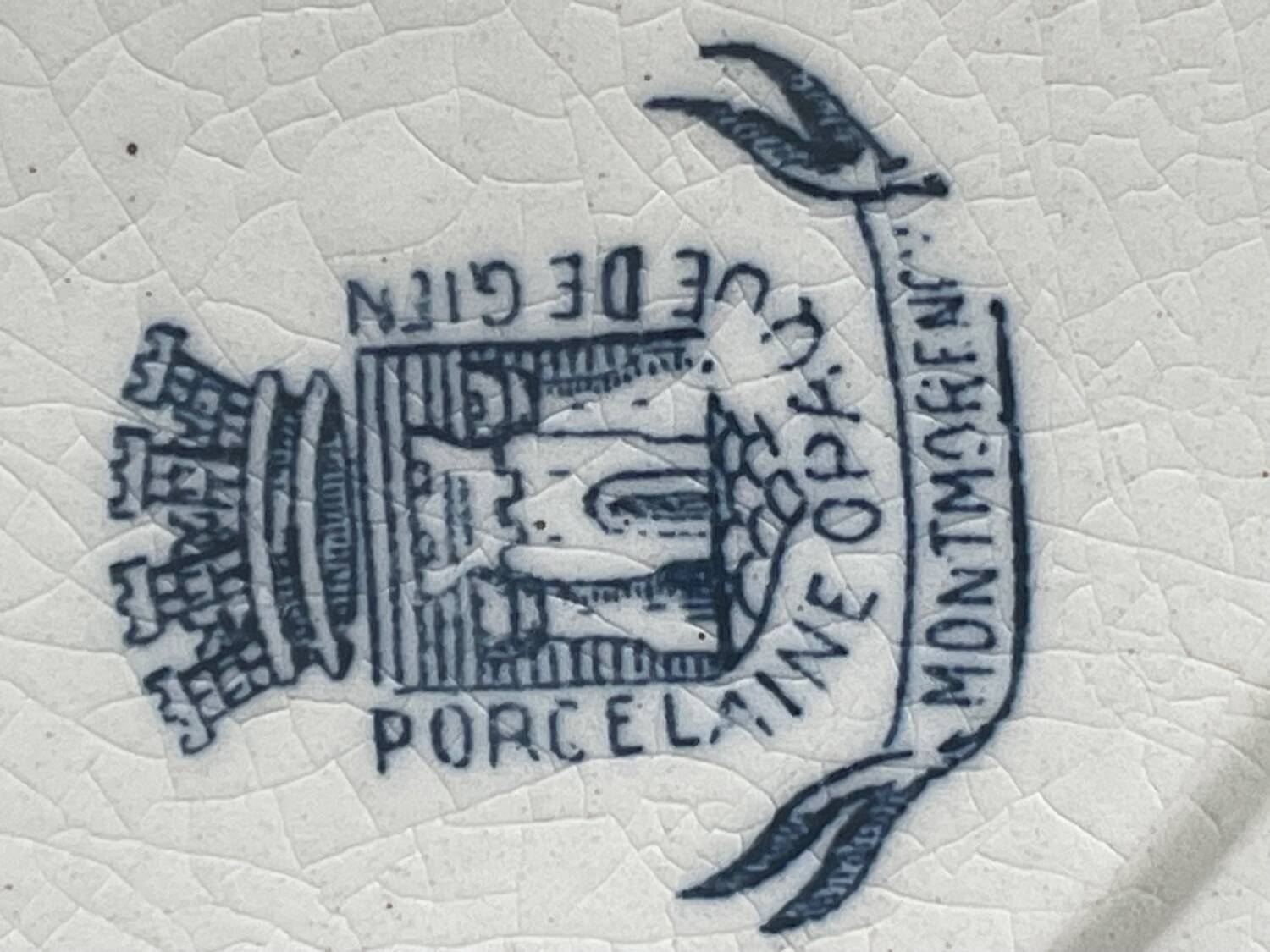 Old opaque porcelain dish from Gien, Montmorency model